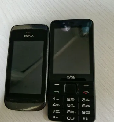 Nokia 309 telefoni va Artel 1
