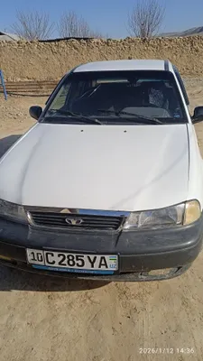 Nexia 1, белая, 2005 г. 1