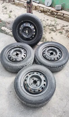 Продаю Диски с шинами 185/65/R14 штамповки 1