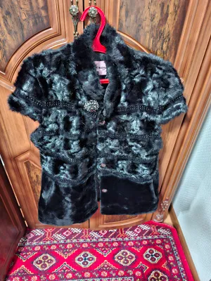 Тёплая жилетка