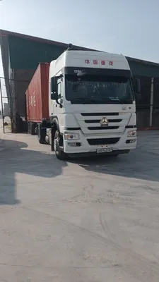 HOWO A6 контенеравоз прицеп комплект сотилади 1