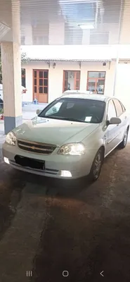 Lasetti 1.8, 2009 года, белого цвета, краска чистая, пробег 19 тысяч, на бензине 1