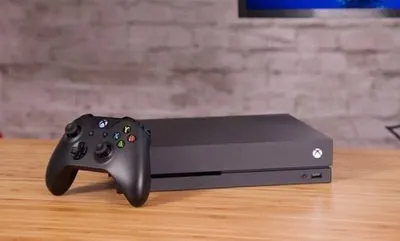 Xbox one x 1tb 1 ta jostik bilan