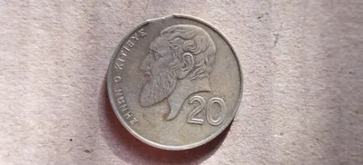 Продаётся монета Кипр с номиналом в 20, 2001 года с откусанным гуртом 1