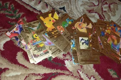 Oltin pokemon kartalari 37 ta 26ming som donaga 700 som 1
