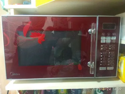 Midea mikroto‘lqinli pech 1