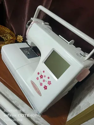 Janome, делает вышивку и наклейку 370 1