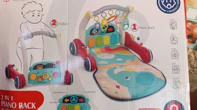 Игрушка и коврик