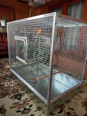 Из алюминиевого уголка, изготовлено из сварной сетки, дно из жести 1