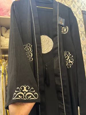 Yangi ayollar qora abayasi