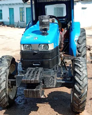 Продаётся мини-трактор New Holland TT 40, цена — 13 000 долларов, Чуст, Наманган 1