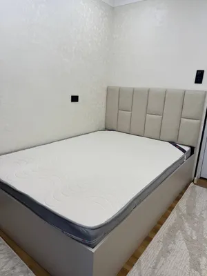 Кровать с матрасом размер 2м на 140м удобная.