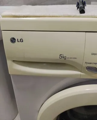 Стиральная машина на 5 кг LG WD-80150NU 1
