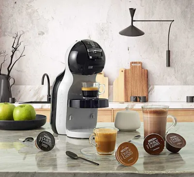 Капсульная кофе машина Delonghi