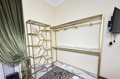 Bolalar kiymlari uchun stelaj 1