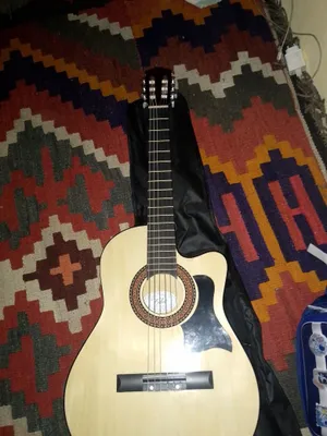 gitara yangi sotiladi holati ishlatilmagan 1