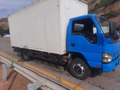 Isuzu, установлен двигатель SNG, приборная панель и состояние SNG отличные, передние колёса новые 1