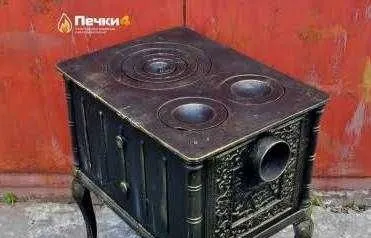 Антикварная чугунная варочная Печь с обогревом. 1