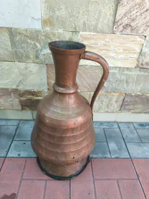 Misdan yasalgan burnisiz kuza yoki oftoba)