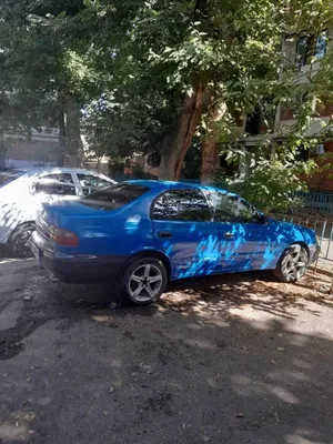 TOYOTA CARINA E 1993 года 1