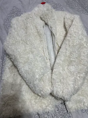 Белая куртка, пух не сбивается 1