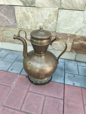 традиционный восточный кумган (офтоба) для воды.