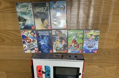 Nintendo Switch va o‘yinlar bilan 9 ta kartrij 1