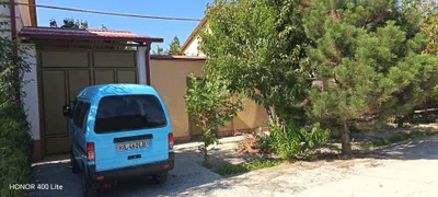 В Джомбае, в Шаймане, участок 6 соток с домом у дороги