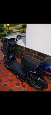Скутер модели Drongo JK Saka с установленными сигналами Malibu 1