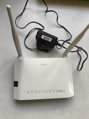 Беспроводной маршрутизатор (Wi-Fi роутер) D-Link (белый, 4 порта, DSL- 1