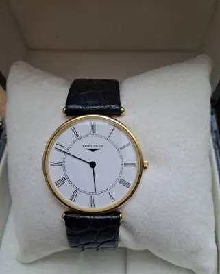 750 probali oltin soat, ishlatilgan. Longines brendi