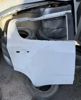 Дверь от Traiblazer заводская замятая 1