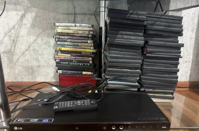 DVD-плеер LG + коллекция дисков/кассет