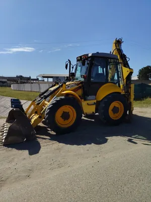 Погрузчик New Holland 115 1