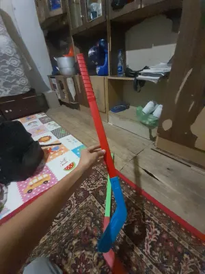 Игрушечные хоккейные клюшки и шайба, цена 50 тысяч 1