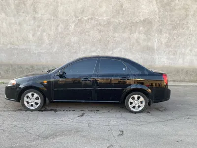 Chevrolet Gentra 1.5, чёрная, с дополнительными опциями 1
