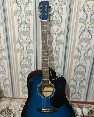 Gitara sotiladi 1 million 300 ming sum holati yangi ishlatilmagan! 1