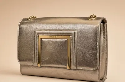 Jimmy Choo bronza-oltin metallik sumka, ishlatilgan, ideal holatda, original 1