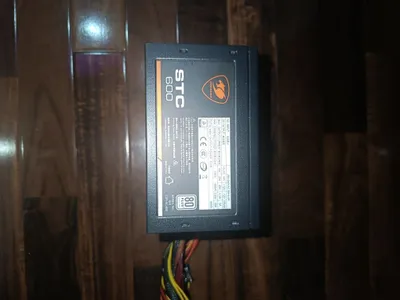 Ishlaydigan Cougar STC 600W 80+ quvvat bloki 1