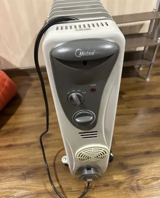 Масляный обогреватель радиатор MIDEA б.у. 1