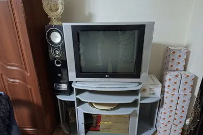 Телевизор ва поставка