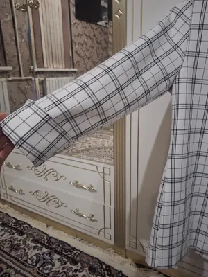 Kastyum 48razmer orqani yopadi 60mingga sotiladi 1