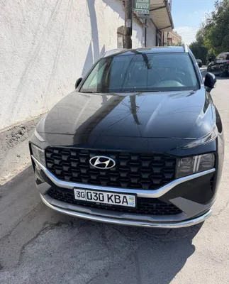 Ideal holatdagi qora rangli Hyundai santa fe 1