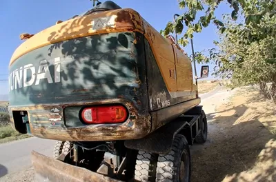 Экскаватор Hyundai 140 1