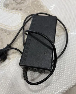 Elektr samokati uchun 54,6V 2A zaryadlash qurilmasi 1