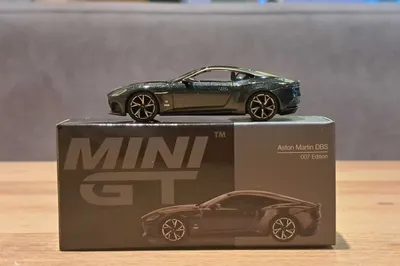 MINI GT машинка . 1