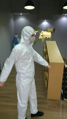 Kapюшonli himoya kombinezoni 1