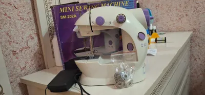 Mini tikuv mashinasi 1