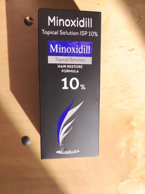 Minoxidil 10%, + dermaroller 1