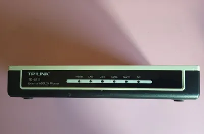 TP-Link TD-8811, внешний ADSL2+ модем/роутер 1